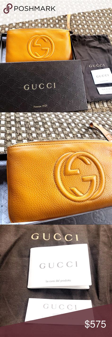 gucci orange soho wristlet